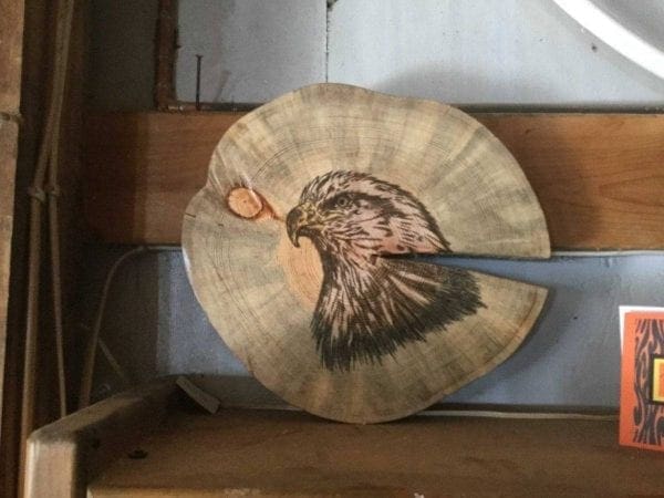 hand painted eagle on log