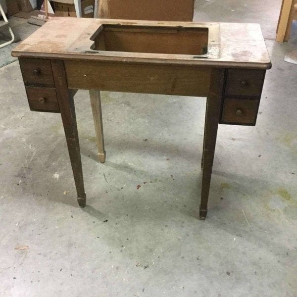 Damaged Wood Sewing Table
