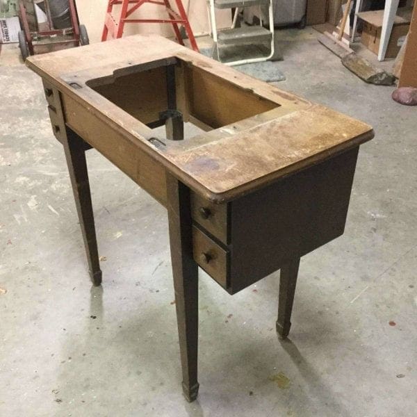 Damaged Wood Sewing Table