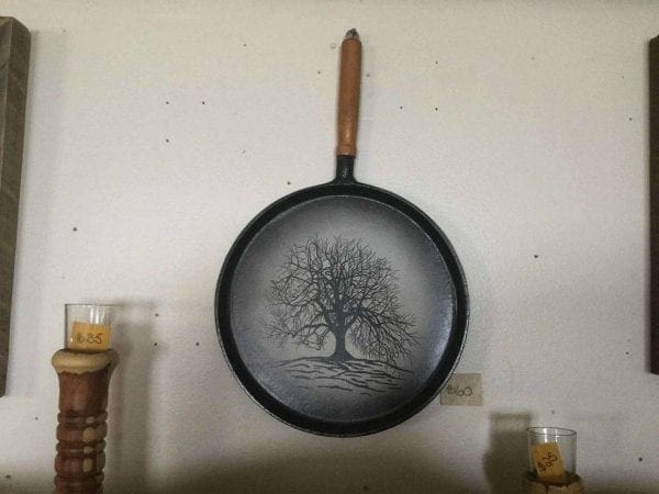 Hand painted tree on cast iron pan